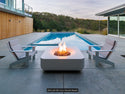 Lumacast Raio soft-Modern outdoor setting with a fire pit table by a poolside.
