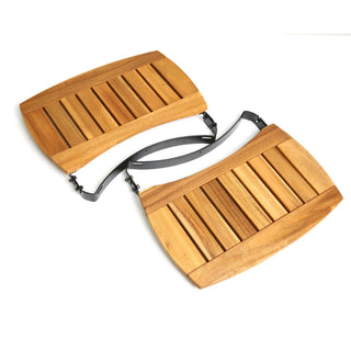 Pair of wooden footstools with a strap on a white background