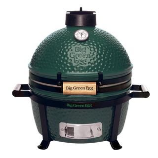 Green Big Green Egg grill on a white background