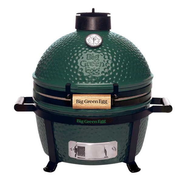 Green Big Green Egg grill on a white background